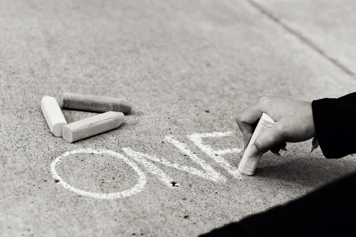 The ONE Book - writing 'one' in chalk